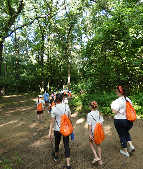 campers hiking down path